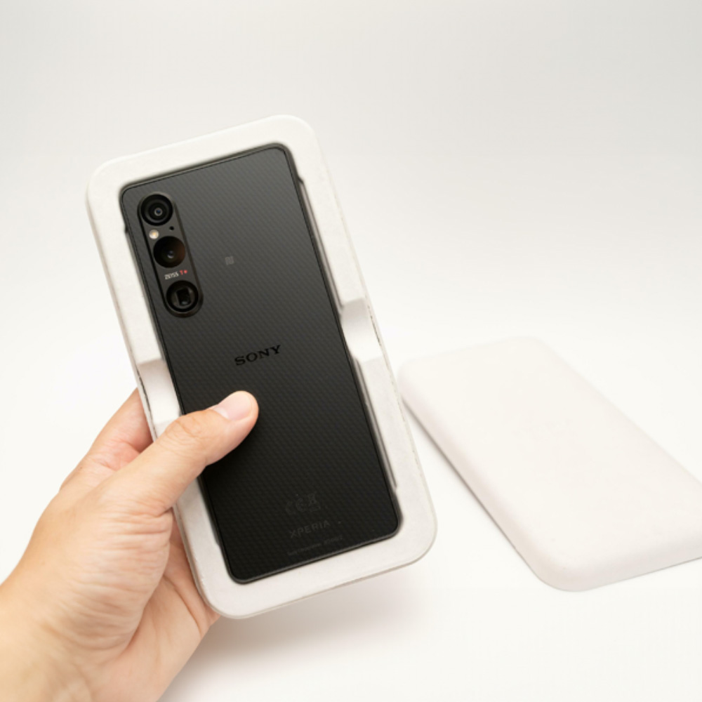 Sony Xperia smartphone packaged in protective custom-fit molded pulp tray instead of plastic