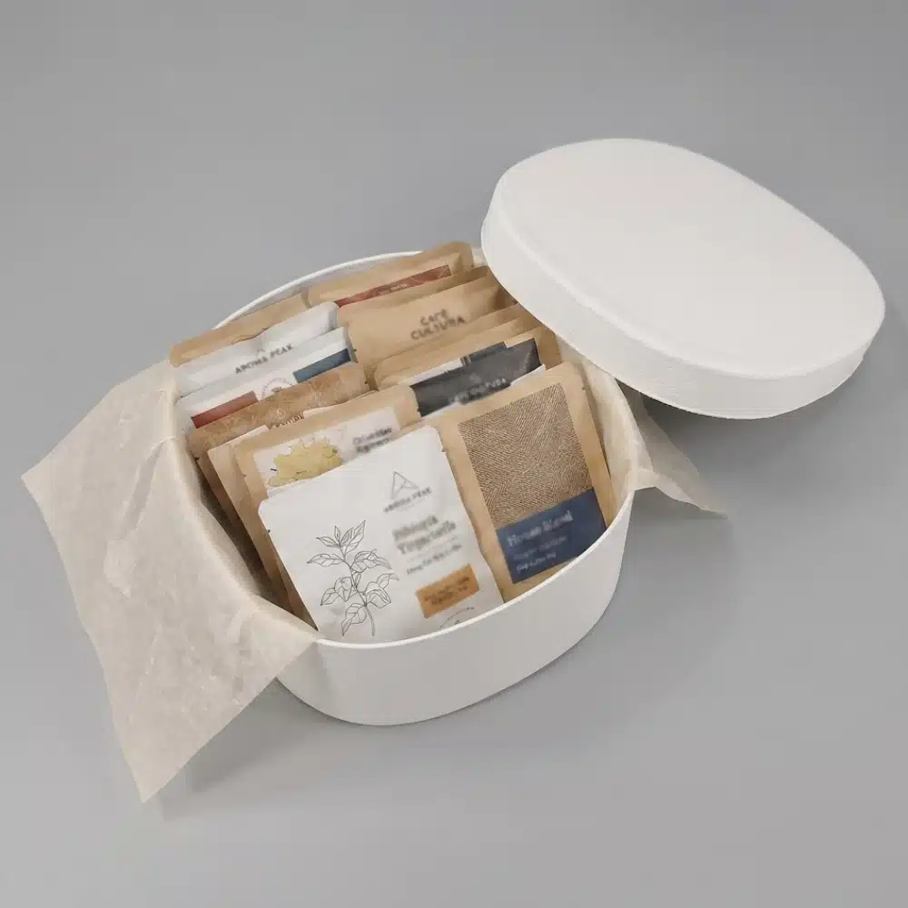 Round Sustainable Coffee Packaging with Sleeve
