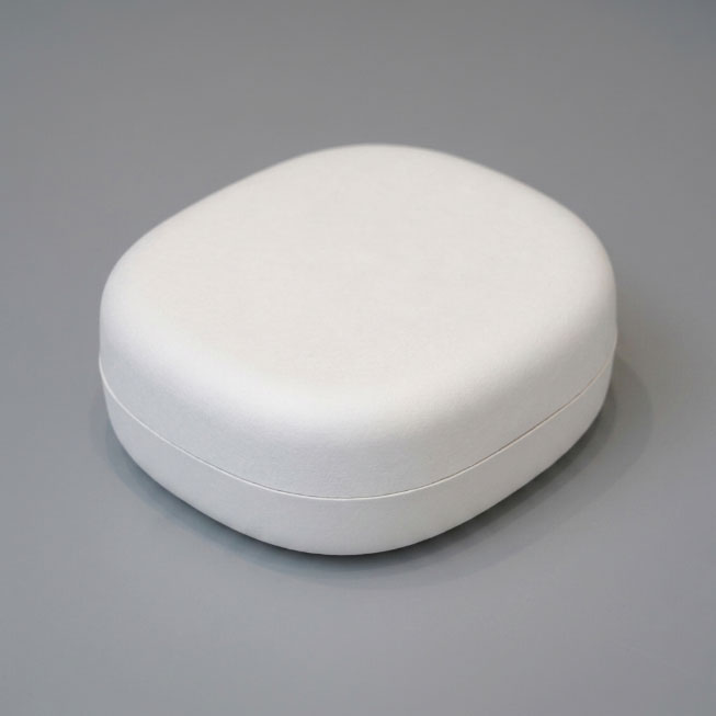 Universal molded pulp packaging shell used across multiple industries