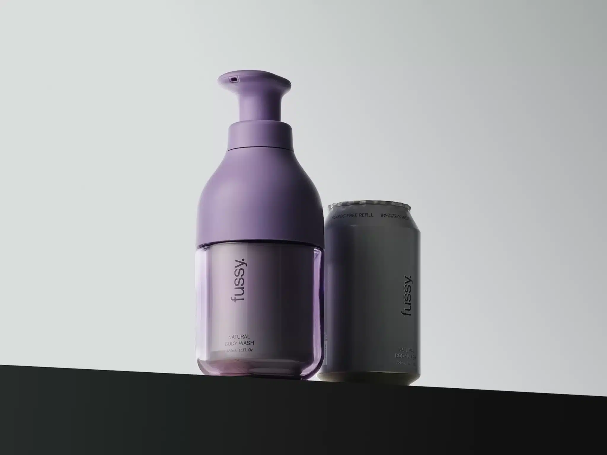 Fussy refillable body wash dispenser and aluminium refill