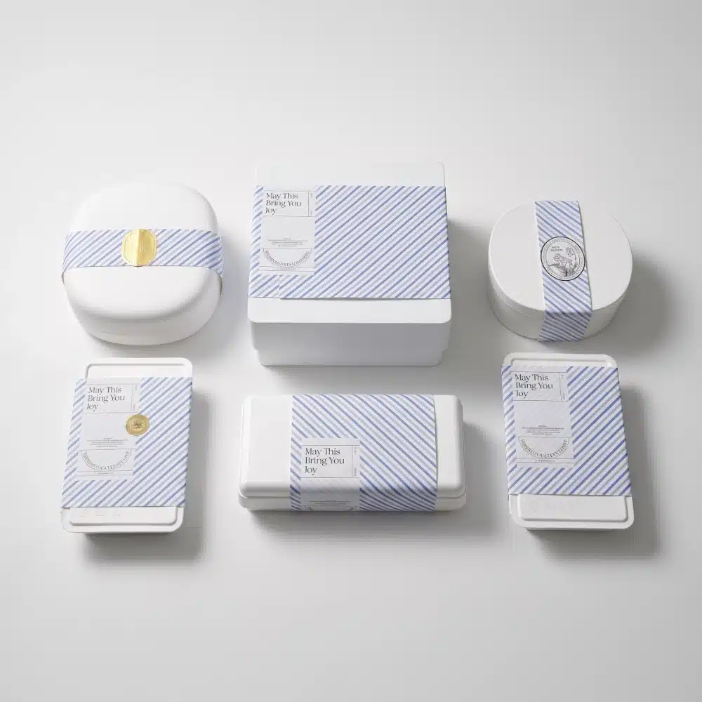 Parfümbox-Set aus geformtem Zellstoff mit blauen Streifen
